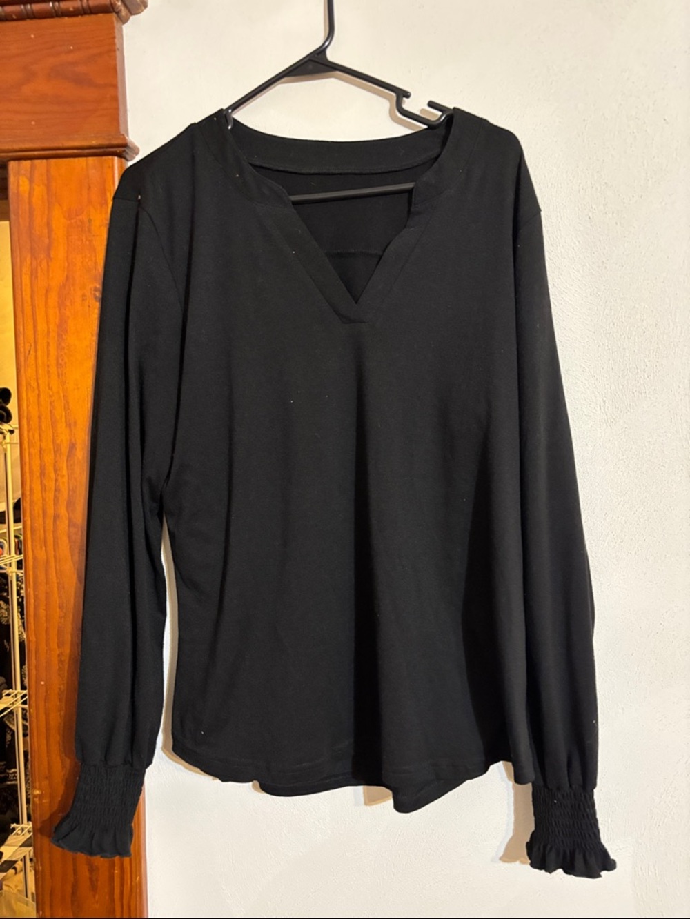Black Long-Sleeve V-Neck Top with Smocked Cuffs